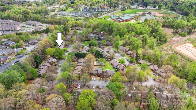 birds eye view of property with a residential view