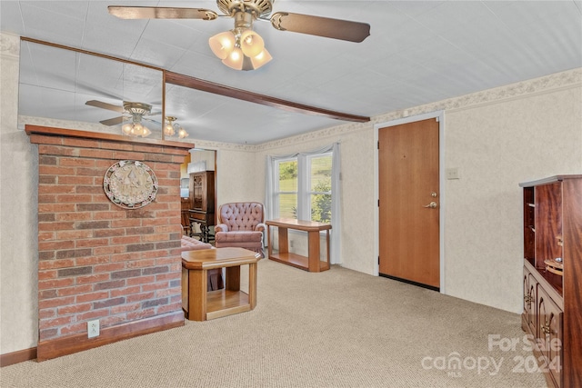 sitting room with light carpet and ceiling fan