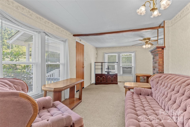 carpeted living room featuring cooling unit and ceiling fan with notable chandelier