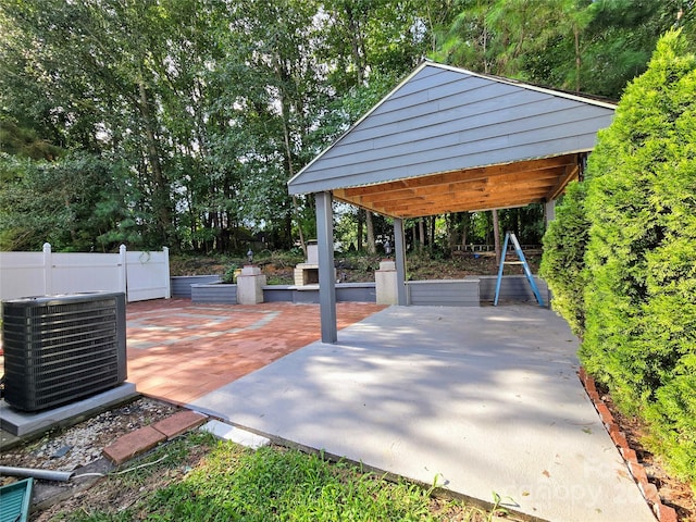 view of patio featuring a gazebo and central AC