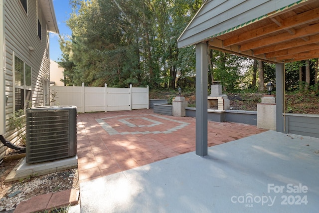 view of patio with central AC