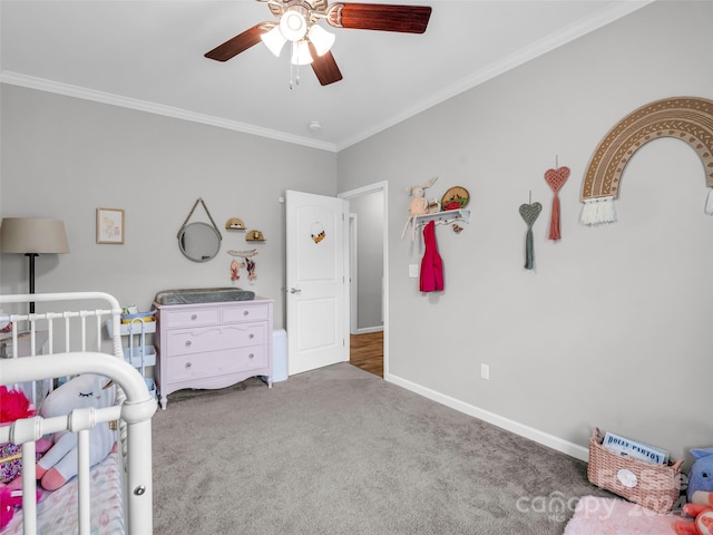 carpeted bedroom with crown molding and ceiling fan