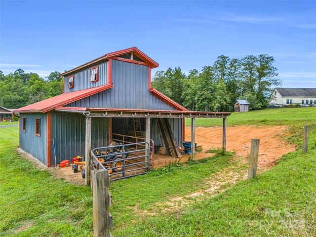 view of outdoor structure with a yard