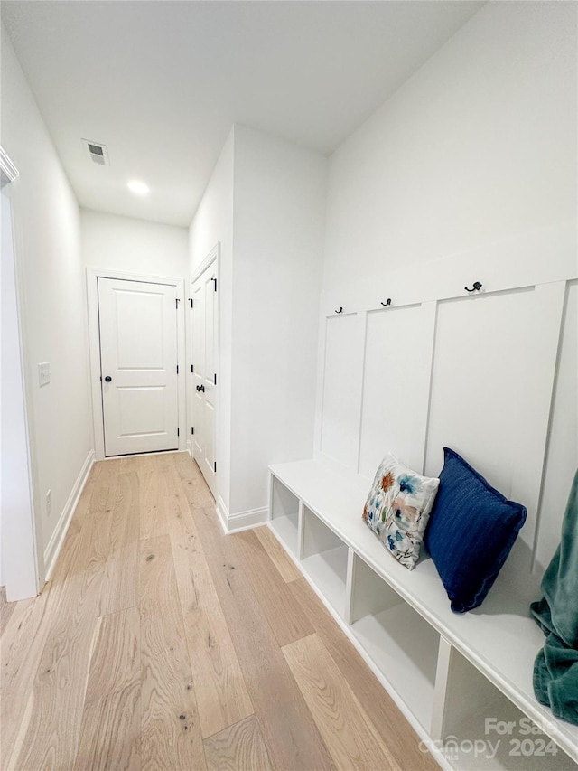 mudroom with light wood-type flooring