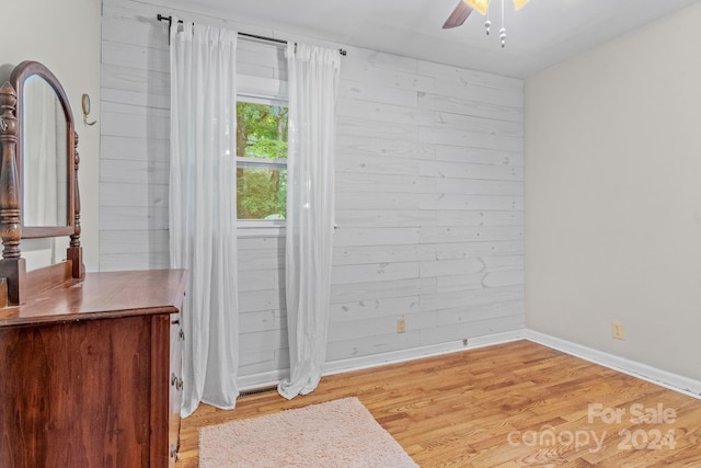 interior space with light hardwood / wood-style flooring and ceiling fan