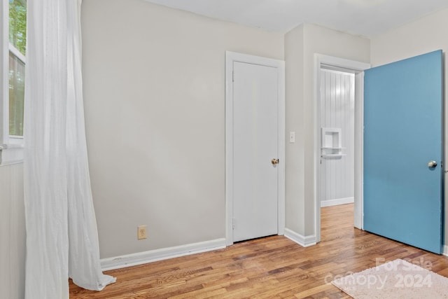 unfurnished bedroom featuring light hardwood / wood-style flooring