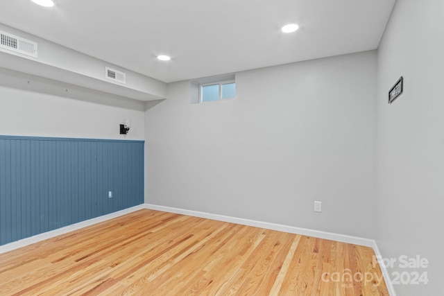 empty room featuring wood-type flooring