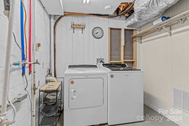 laundry area with washer and clothes dryer