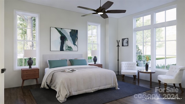 bedroom featuring multiple windows and hardwood / wood-style floors