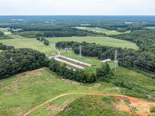 birds eye view of property featuring a rural view