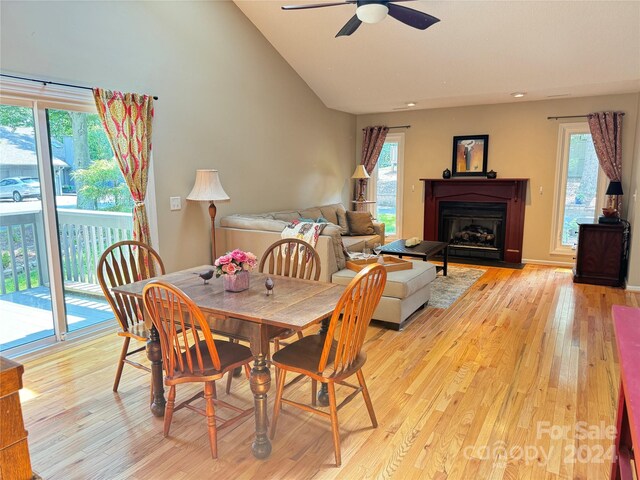 dining room featuring light hardwood / wood-style flooring, ceiling fan, and a healthy amount of sunlight