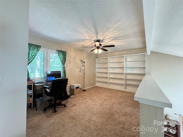 office space with ceiling fan, a textured ceiling, and carpet floors