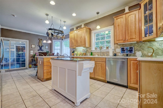 kitchen with pendant lighting, light tile patterned floors, stainless steel dishwasher, and a kitchen island