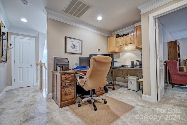 carpeted office space with ornamental molding