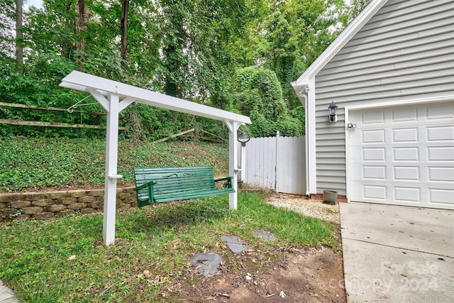 view of yard featuring a garage