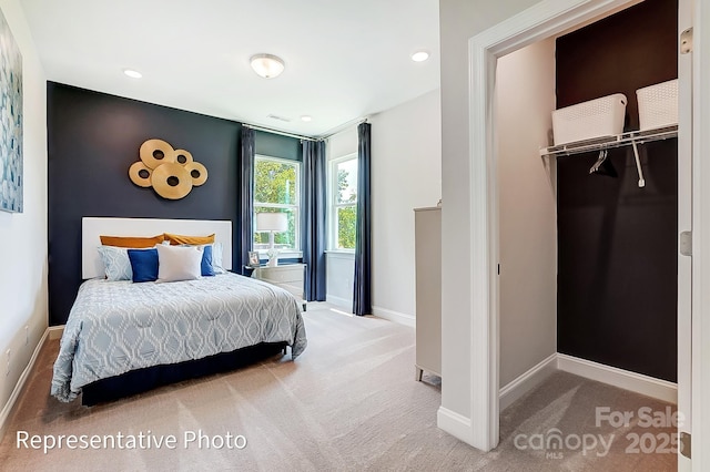 bedroom with carpet floors and a closet