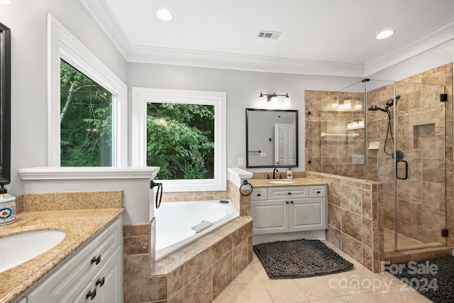 bathroom with independent shower and bath, tile patterned floors, dual bowl vanity, and ornamental molding