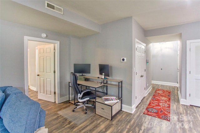 office space with hardwood / wood-style floors