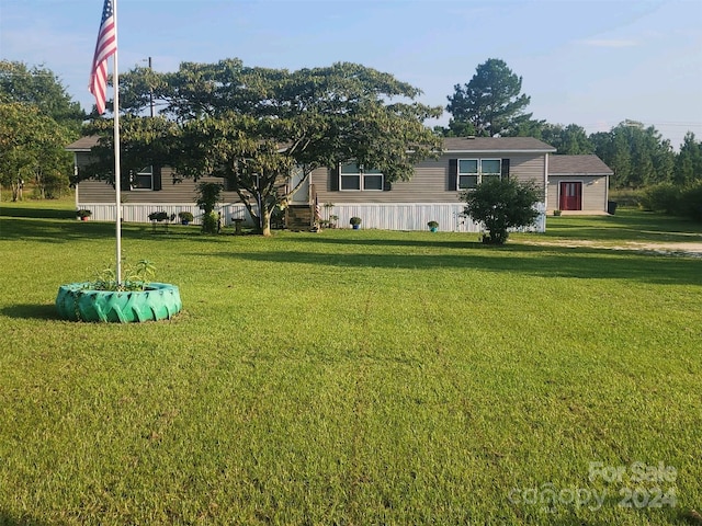 exterior space with a front lawn