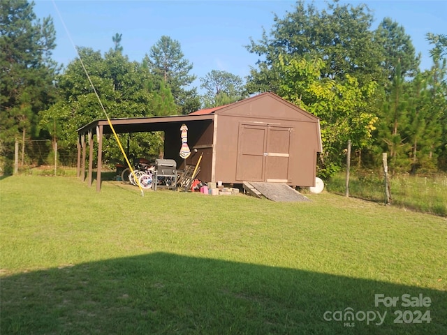 view of outdoor structure with a yard