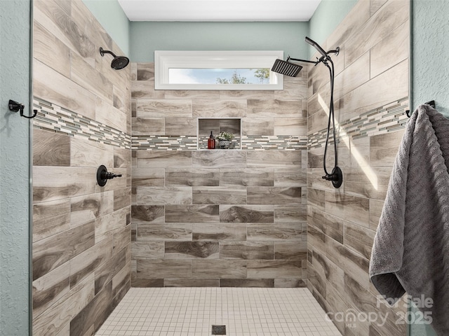 bathroom featuring tiled shower