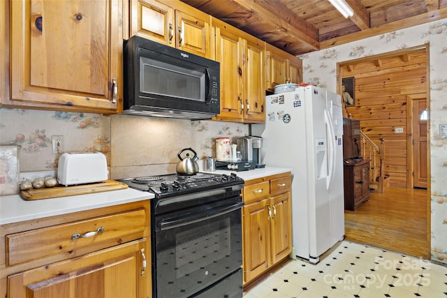 kitchen with black appliances, wallpapered walls, wooden ceiling, light countertops, and light floors