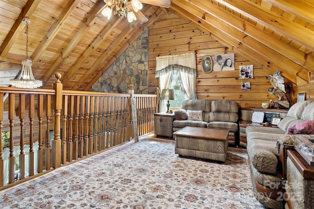 sitting room featuring vaulted ceiling with beams, ceiling fan, wood ceiling, and wooden walls