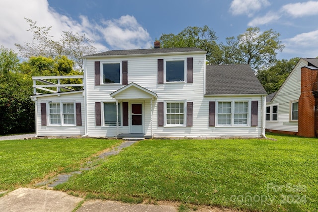 colonial house with a front lawn