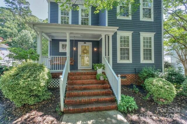 exterior space featuring covered porch