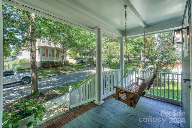 unfurnished sunroom featuring a healthy amount of sunlight