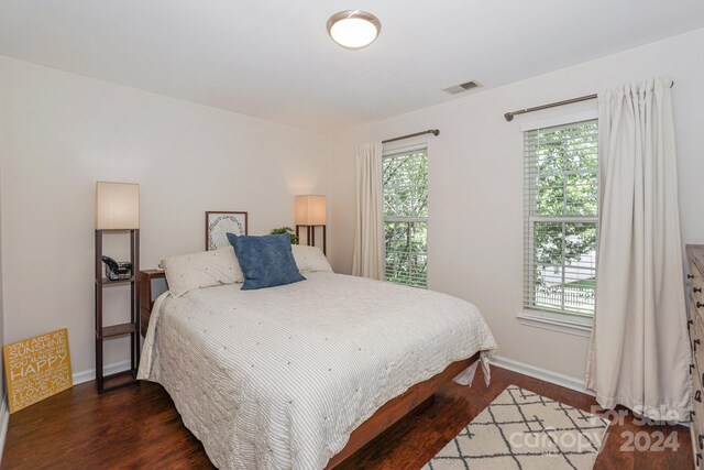 bedroom featuring wood-type flooring