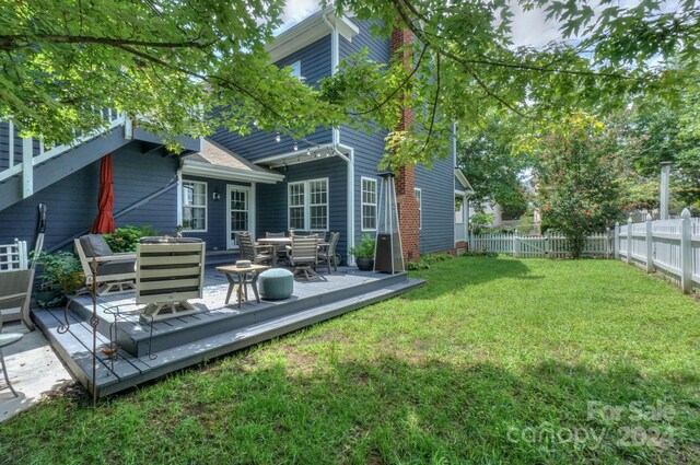 view of yard with a deck