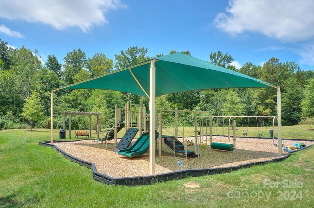 view of playground featuring a yard