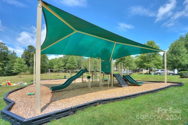 view of jungle gym with a yard