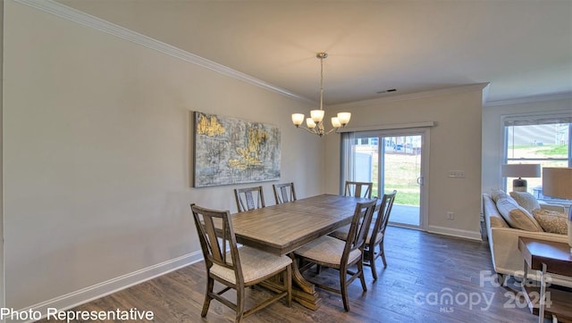 dining area with dark wood-style floors, a healthy amount of sunlight, and visible vents