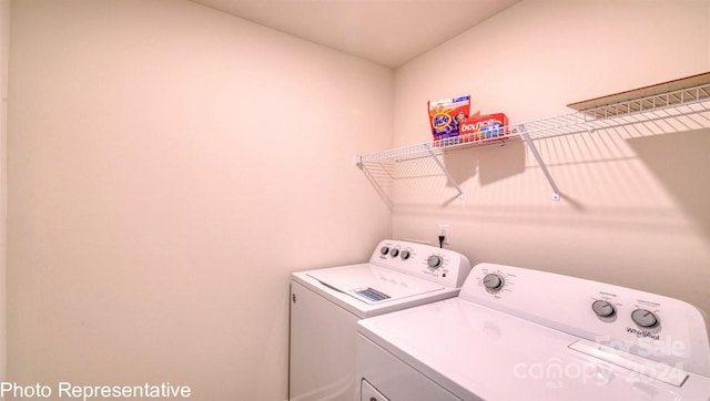 laundry room featuring laundry area and separate washer and dryer