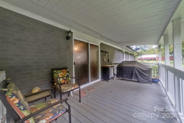 wooden terrace with grilling area