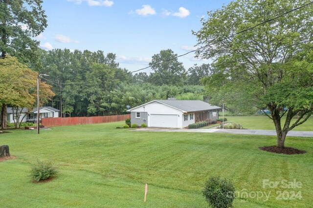 view of yard featuring a garage