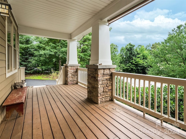 wooden deck featuring a porch