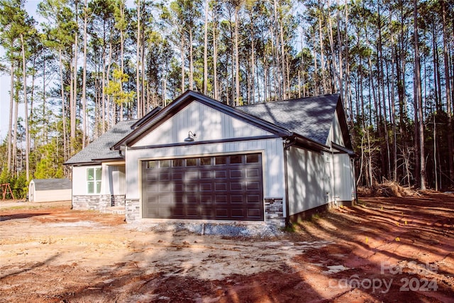 exterior space featuring a garage