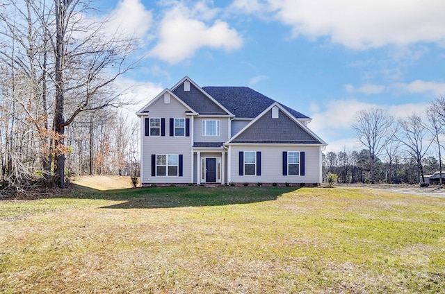 view of front of property with a front lawn