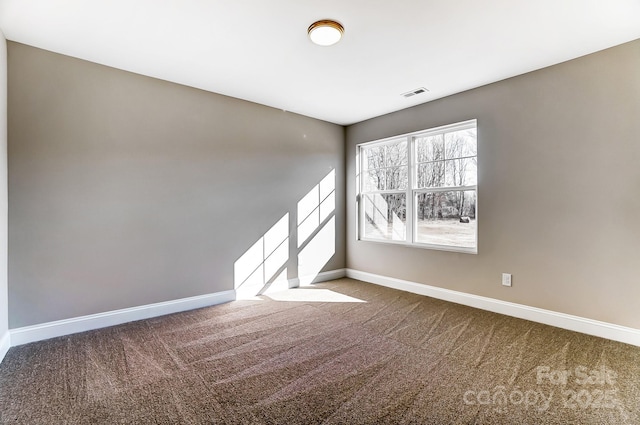 view of carpeted spare room