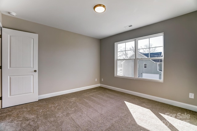 view of carpeted spare room