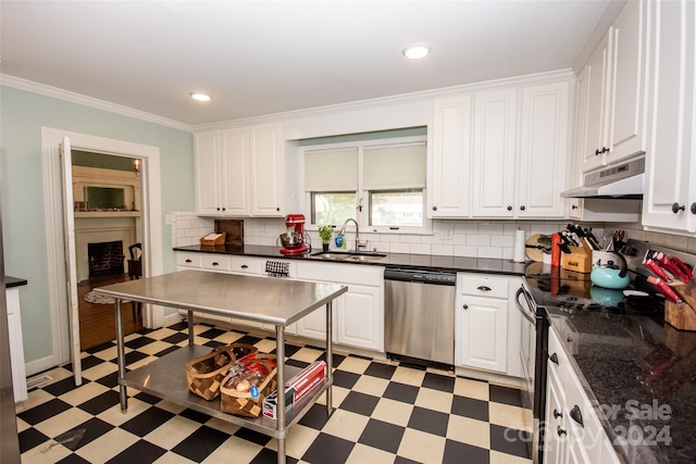 kitchen with sink, ornamental molding, appliances with stainless steel finishes, decorative backsplash, and white cabinets