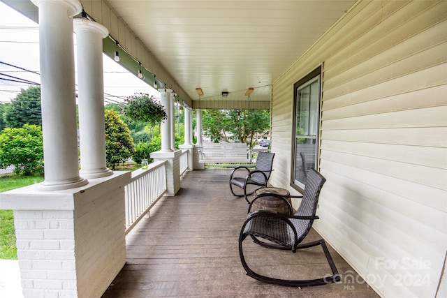 wooden deck with a porch