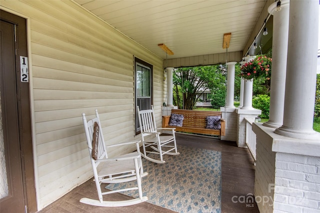 view of patio featuring covered porch