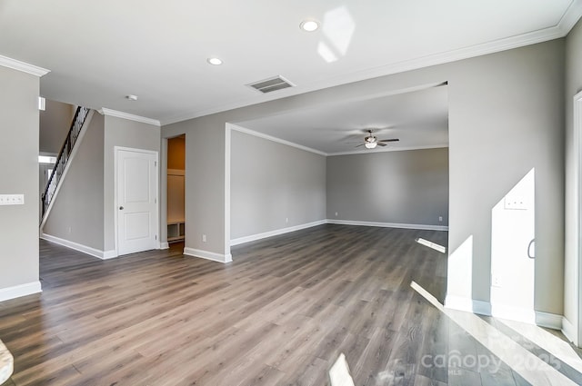 interior space with ceiling fan, wood-type flooring, and crown molding