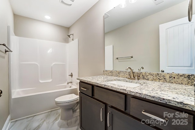 full bathroom featuring toilet, vanity, and shower / tub combination