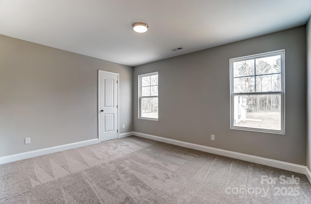 view of carpeted spare room