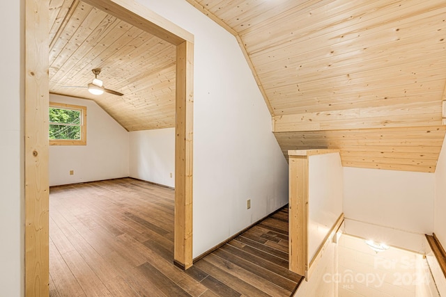 additional living space featuring wood-type flooring, wooden ceiling, and vaulted ceiling